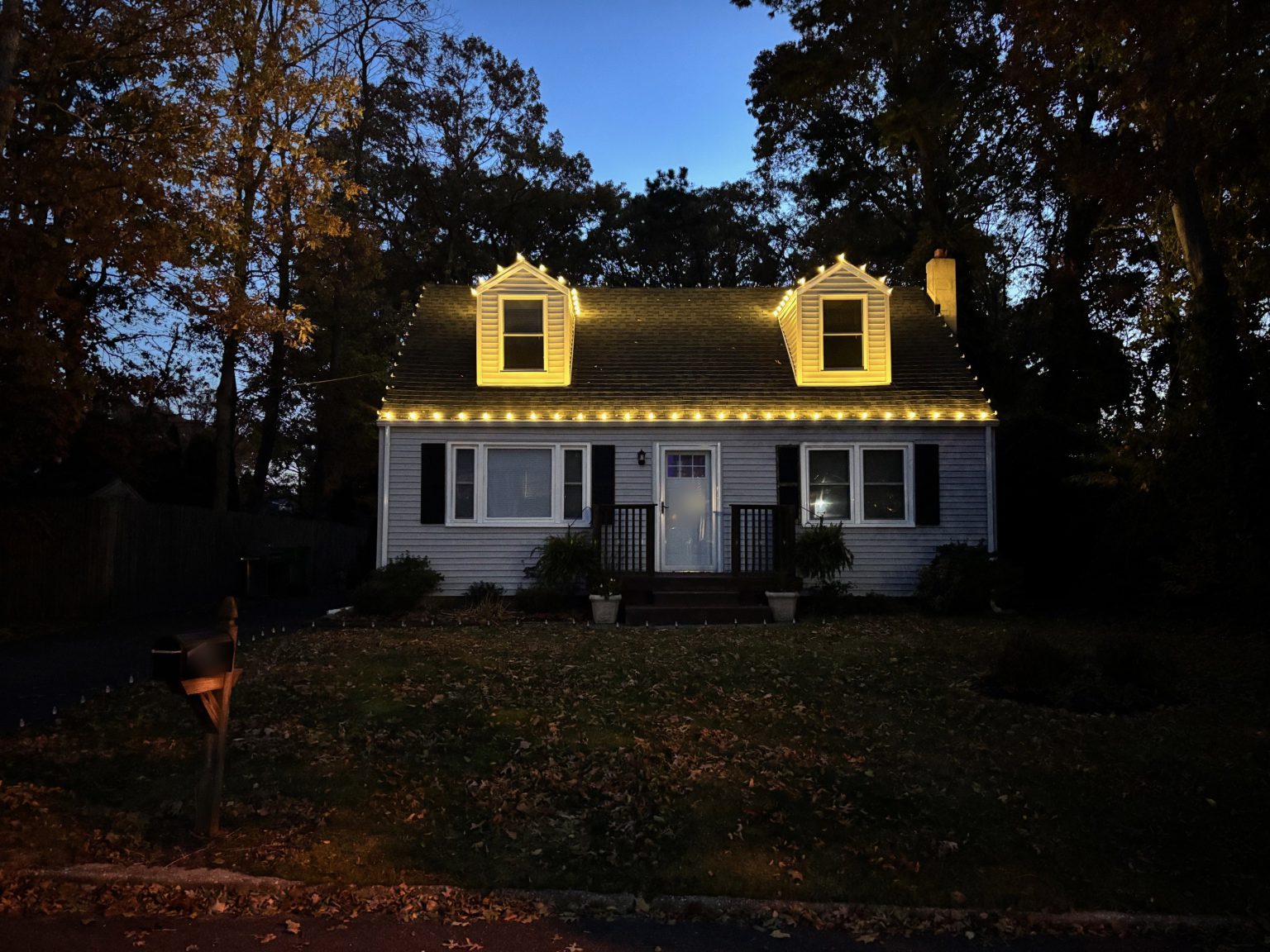A+ Express Lighting with warm white LEDs on the gutter line and dormers of a New Jersey home